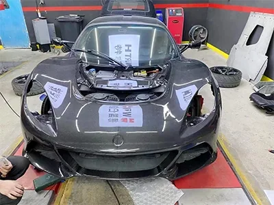 Carbon fiber automotive shell mounted on vehicle